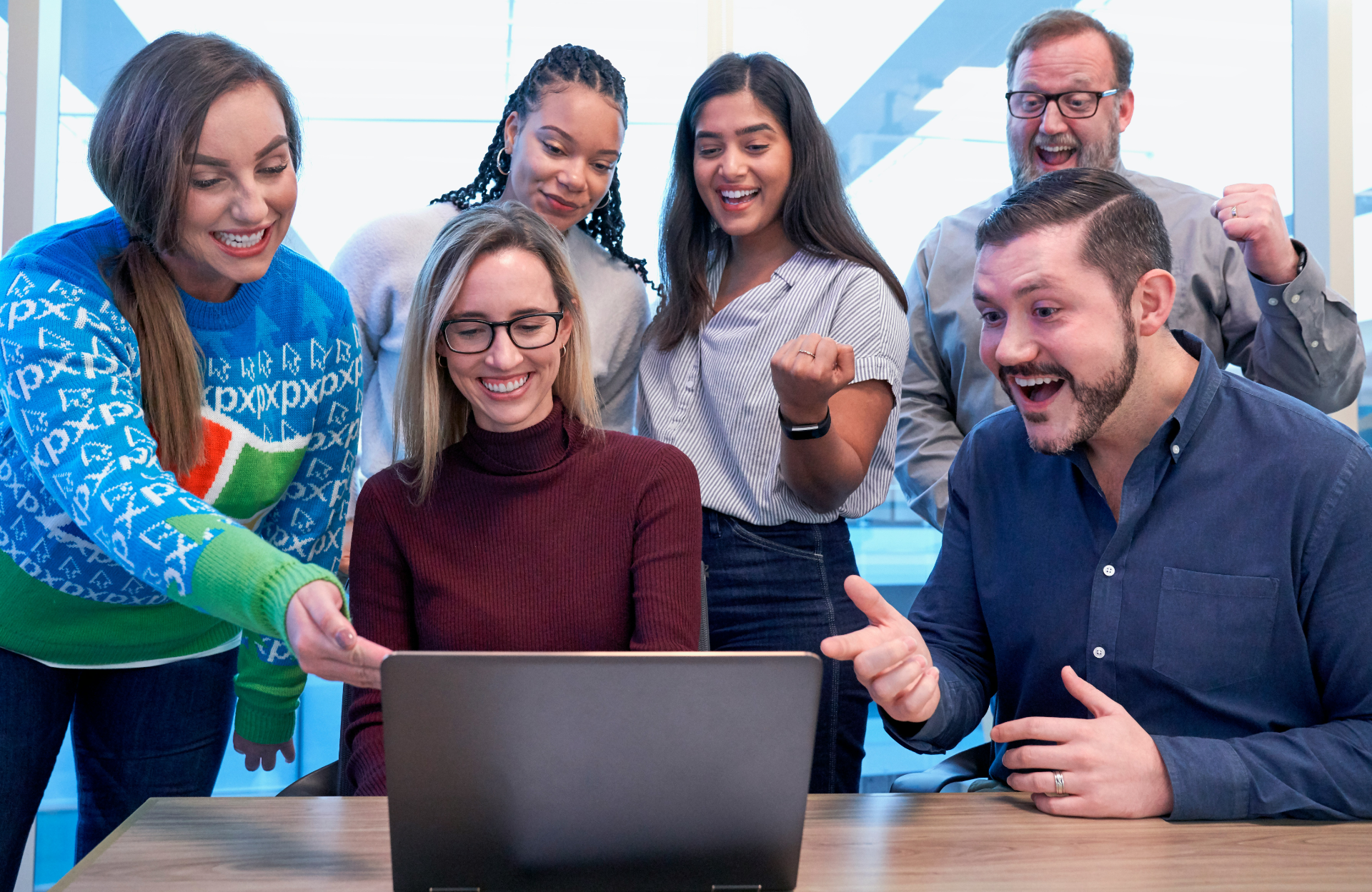 Team looking happy after successful project completion